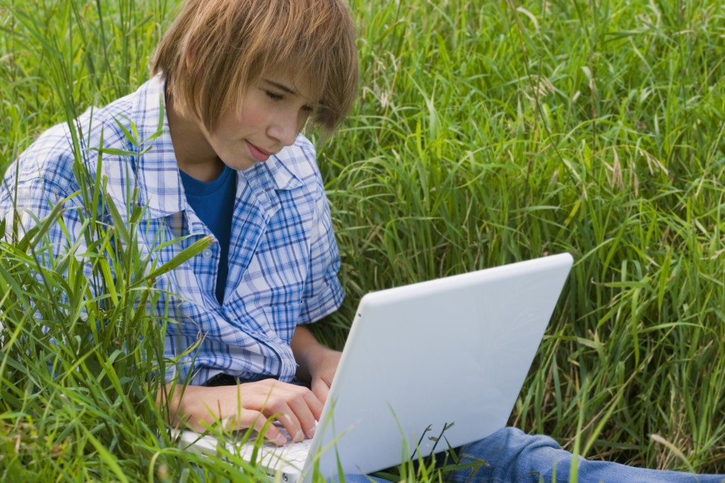 Boy using a laptop